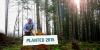 Paul Barnum planting trees