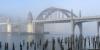 Bridge at the coast with fog. 