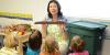 Teacher and students in a classroom. 